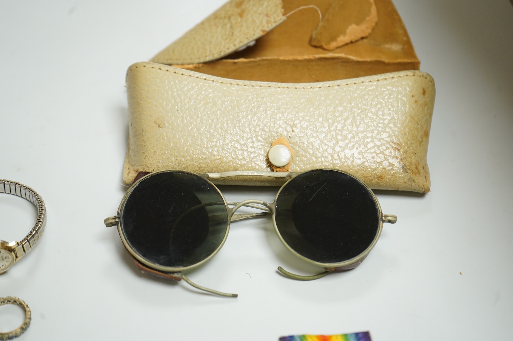 Assorted collectables including medals, aviator's glasses and costume jewellery and an antique seal